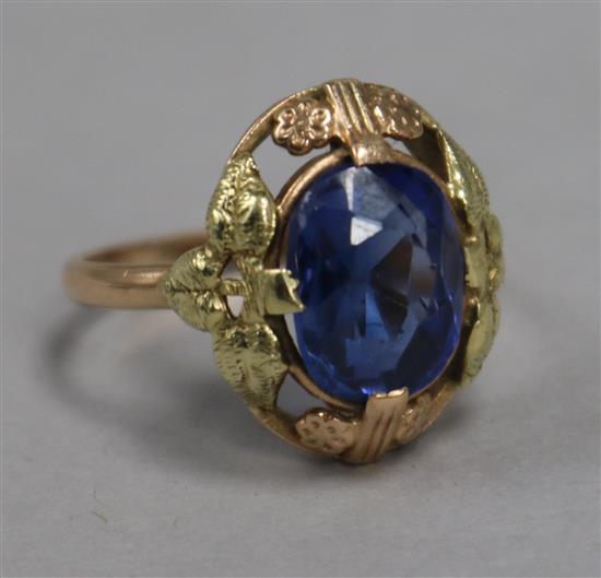 A post 1958 Soviet two colour 583 standard gold and synthetic sapphire dress ring, size O.